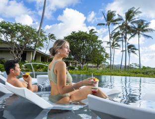 Couple Lounging & Drinks at Bungalow Pool Lifestyle